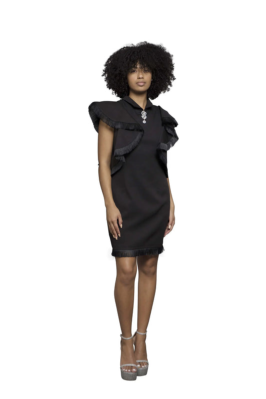 model wearing black short dress, full view