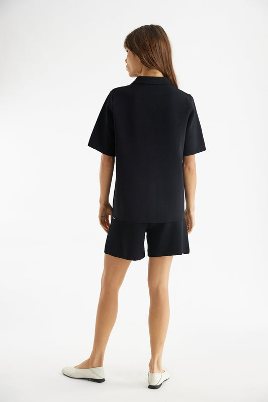 Black nyla shorts, back view
