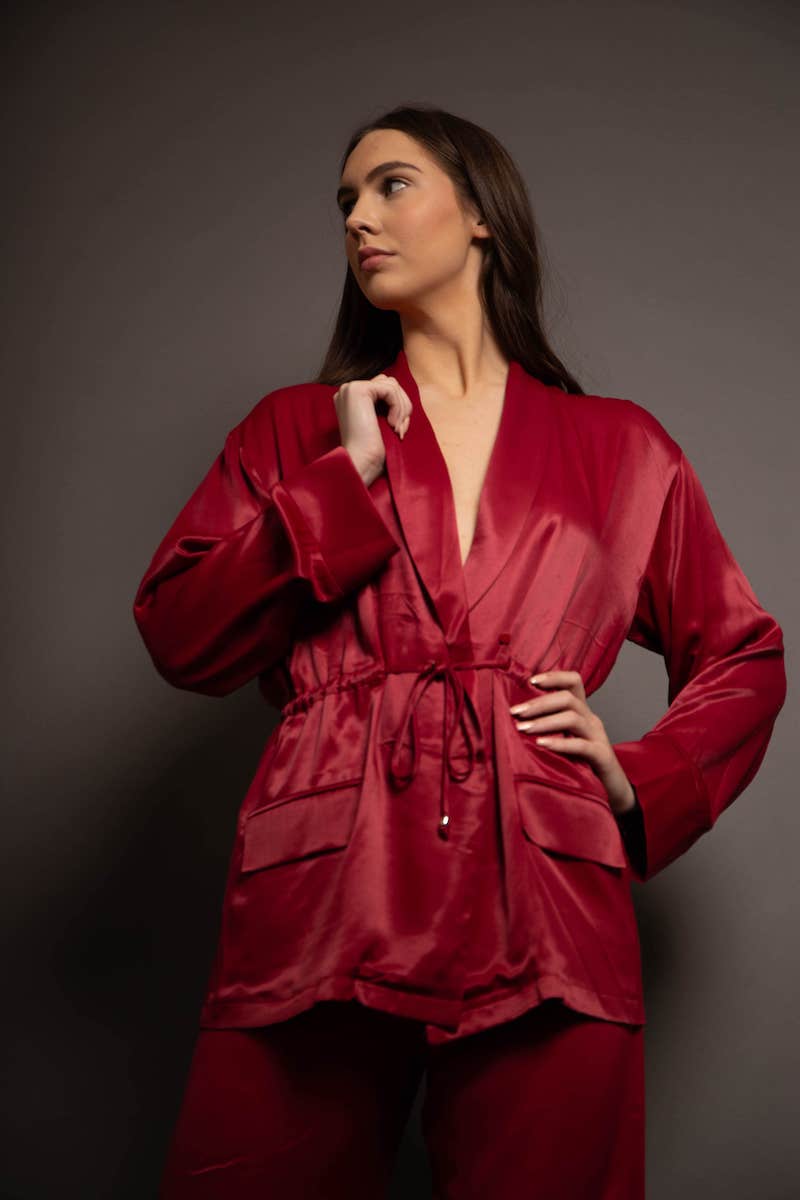 woman wearing a red suit set