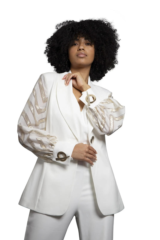 A female model wearing a white jacket, closeup